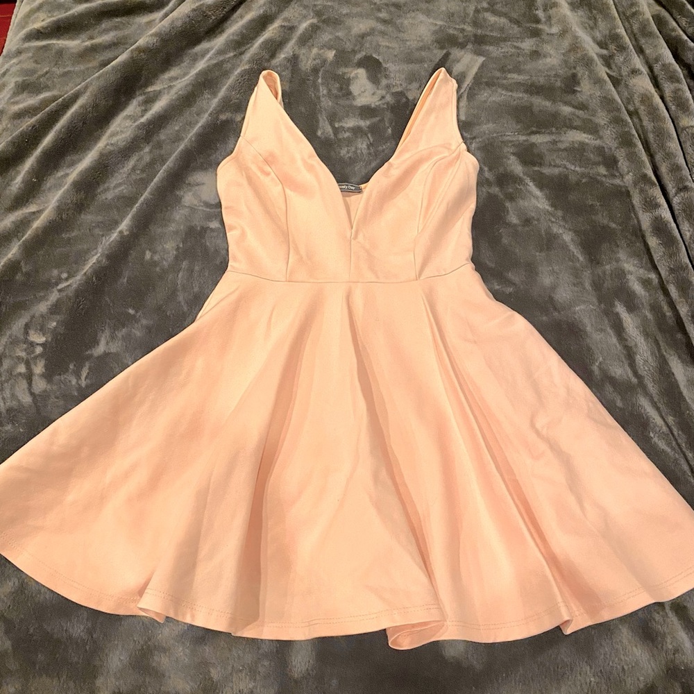 Beautiful “low-cut flared dress”